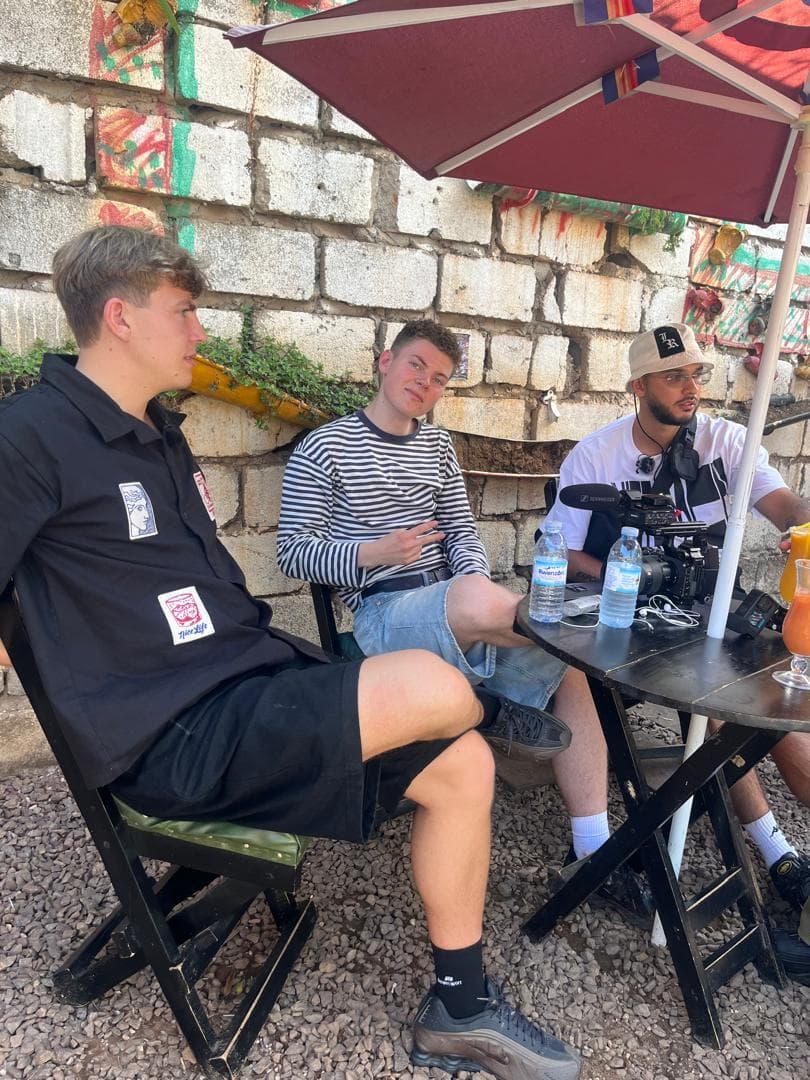Travelers relaxing over lunch at an outdoor café